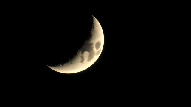 Crescent Moon Phases in Night Sky.