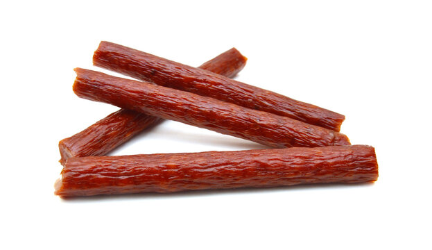 Smoked thin sausages, isolated on white