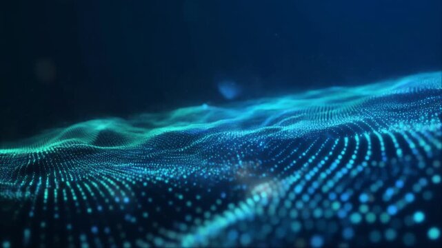 Abstract shimmering blue and green digital wave formed by countless small particles in a dark blue background, representing data flow and connectivity