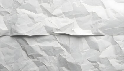 Fototapeta premium A close-up view of crumpled white paper with a crease in the middle