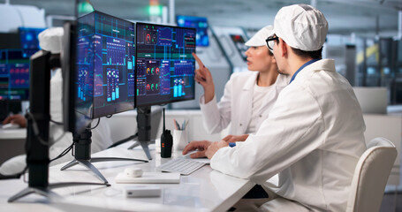 Diverse Team Operating Machinery