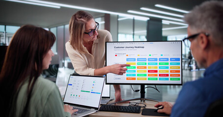 Business Woman Editing Customer Journey Heatmap Using Digital Technology