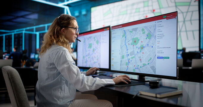 911 Emergency Services: Woman Using Headset To Dispatch Ambulance