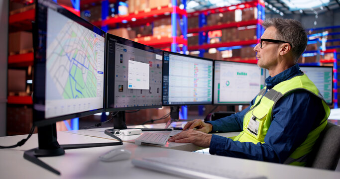 Efficient Logistics Manager Overseeing Warehouse Operations