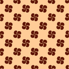 Obraz premium A seamless pattern of brown flowers on a peach background