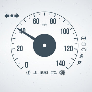 A close-up view of a car's speedometer and dashboard warning lights with icons