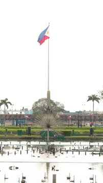 National Flag of the Philippines Waving at Rizal Park in Manila