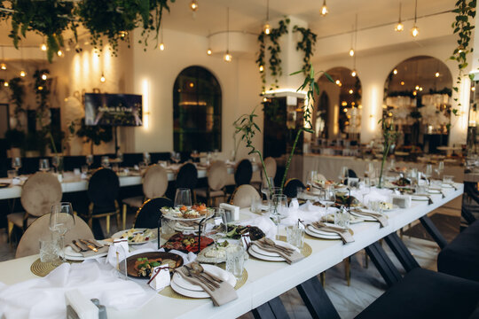 Elegant wedding reception table setting in restaurant