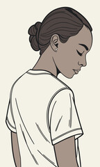 Young woman with hair in a bun looking down in a thoughtful pose.