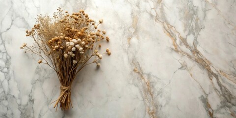 Naklejka premium Dried floral bouquet arranged on a marble surface, showcasing elegant simplicity and natural beauty