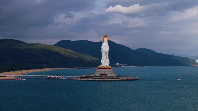 Aerial view Guanyin statue in buddhism in Sanya, Hainan island. Buddhism Nanshan religion park in China.