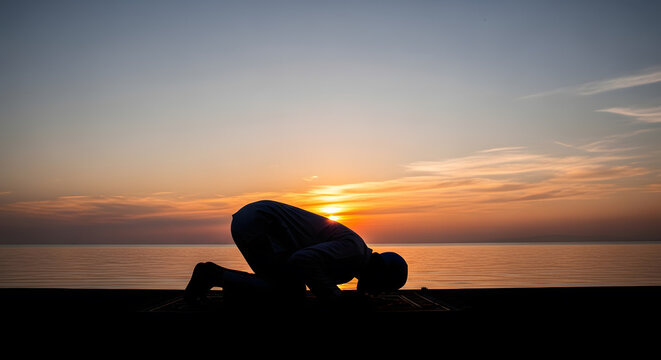 Silhouette of Muslim Person in Sujood Prayer During Sunset