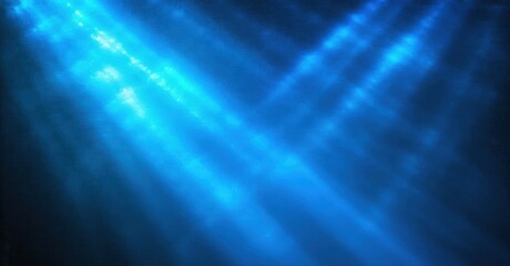 Obraz premium Abstract blue light beams descend. Dark background creates dramatic effect. Texture suggests underwater scene or energy flow.