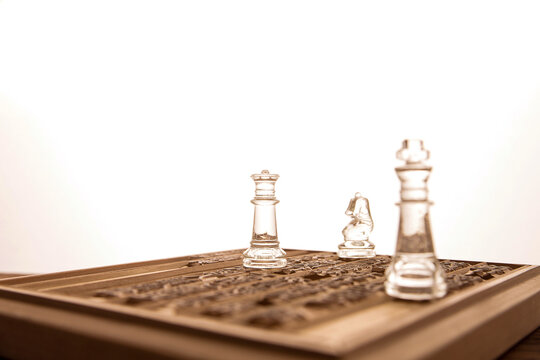 Crystal Chess Pieces on Wooden Board - Strategy Game Entertainment