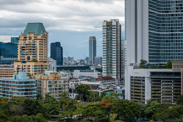 city skyline with green urban park and modern skyscrapers nature harmony, tropical cityscape and high-rise buildings in Bangkok