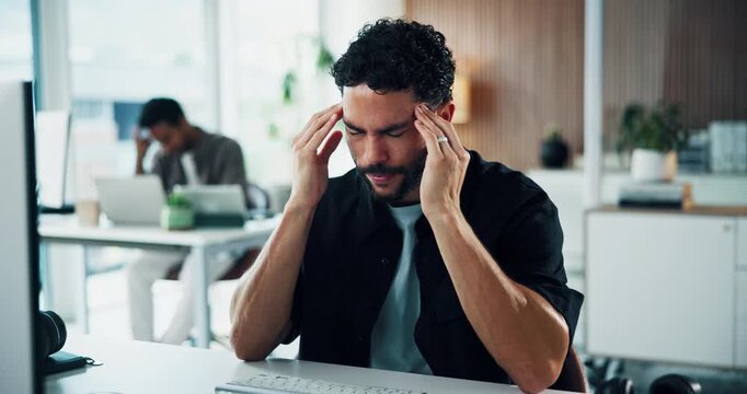 Frustrated, man and headache in office with computer, marketing crisis and fatigue from campaign fail. Coworking, tired person and migraine in advertising agency with desktop, problem and overworked.