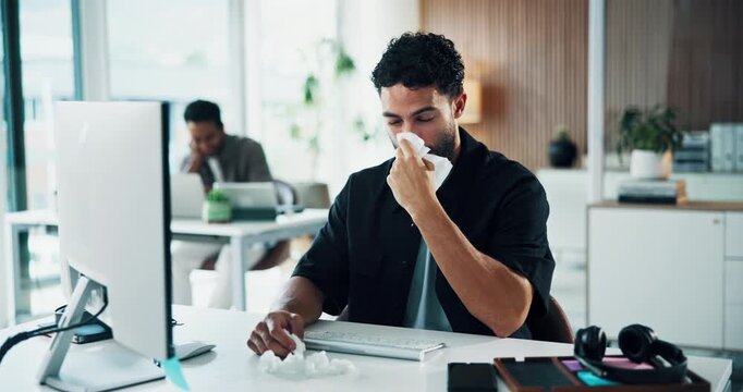 Man, flu and blowing nose in office with toilet paper, computer and sinus infection at marketing agency. Coworking, person and allergy in advertising company with tissue, virus symptoms and desktop.
