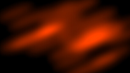 A blurry orange and black abstract image