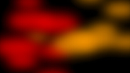 A blurry image with red and yellow colors