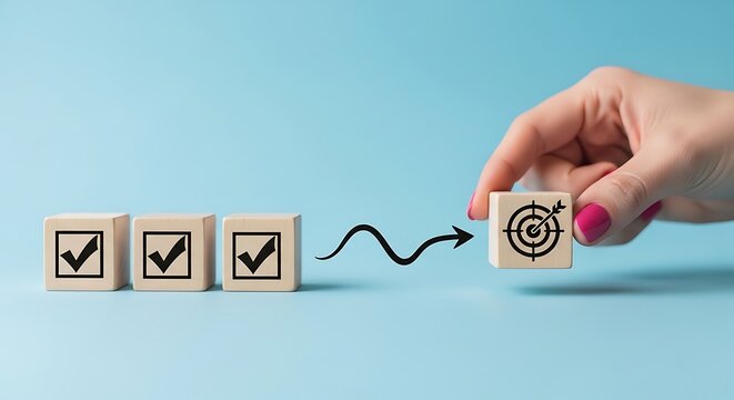 Hand moving wooden block with target symbol to checklist blocks
