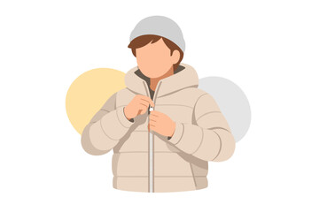 Person wearing a warm winter jacket and hat. © nasyih