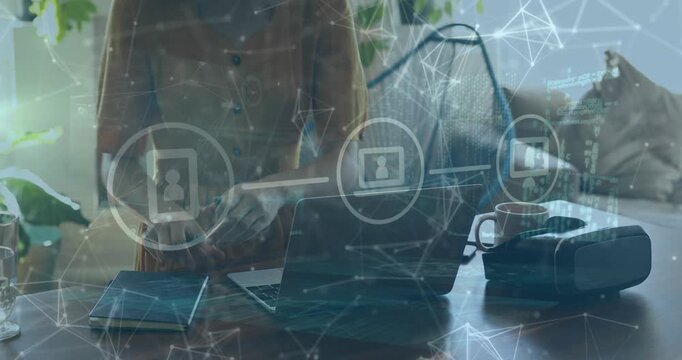 Animation of network of connections with media icons over caucasian woman taking notes