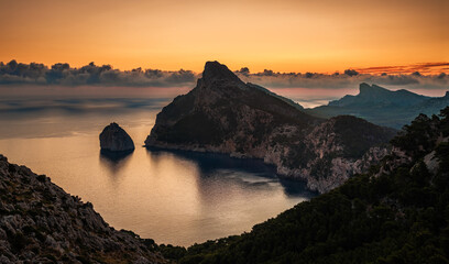 Mallorca, Spain - Aerial view of a golden sunrise at the cliffs of Cap de Formentor, the northernmost point of Mallorca on the Formentor peninsula © zgphotography
