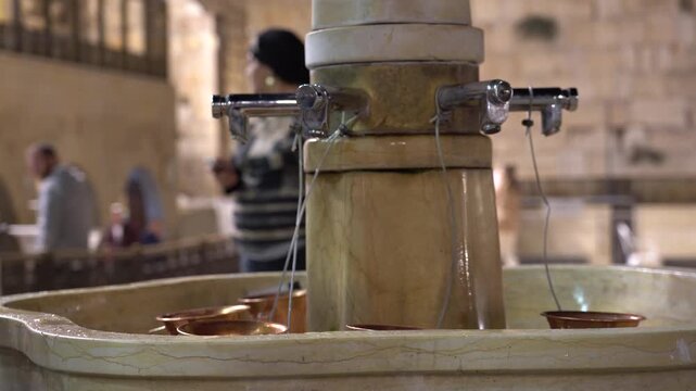 Hand washing ritual at Western Wall in Jerusalem, Israel