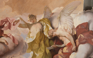 Naklejka premium FLORENCE, ITALY - MARCH 17, 2025: The fresco of baroque angel (detail of Assumption) of church Badia Fiorentina by Gian Domenico Ferretti (1734)