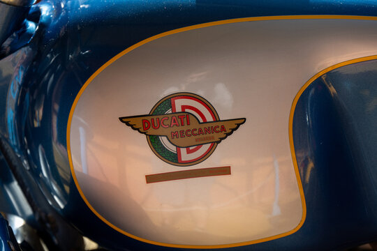 Hervas, Spain - 24 Nov 23: Ducati Meccanica emblem on classic motorcycle fuel tank
