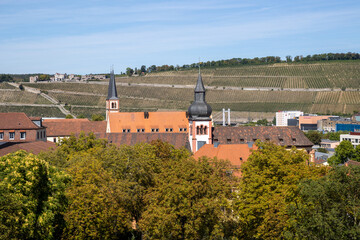 Obraz premium Panoramic view from Festung Marienberg overlooking Würzburg’s historic old town, the Main River and the iconic Old Main Bridge lined with monumental statues.