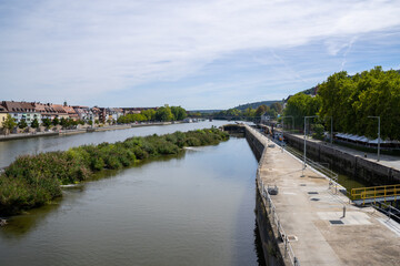 Fototapeta premium The Old Main Bridge (Alte Mainbrücke), historic pedestrian stone bridge with saint statues over the Main River. Würzburg, Germany