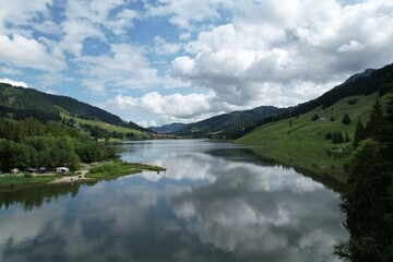 Cloud Reflections on Schwarzsee Alpine Lake, Switzerland