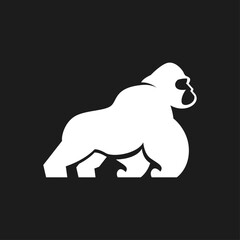 Obraz premium Powerful Gorilla Silhouette Logo Design on Black Background