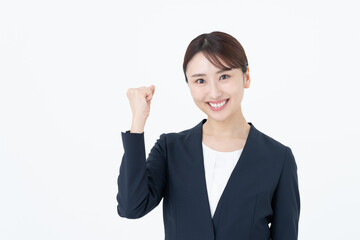 ガッツポーズをする若いビジネスウーマン