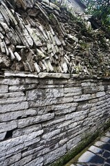 old stone wall with stone