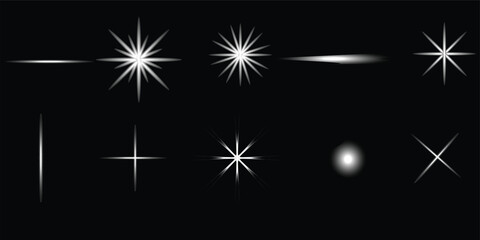 Fototapeta premium Collection of white starburst effects on a black background for graphic design