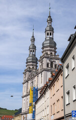 Naklejka premium Stift Haug, Baroque church with a large dome, a historic religious landmark in the city. Würzburg, Bavaria, Germany 