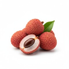 Pile of fresh lychee fruits whole and halved showing seed on white background green leaf