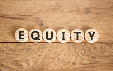 Equity support and help symbol. Concept word Equity on beautiful wooden circles. Beautiful wooden background. Business equity support and help concept. Copy space.