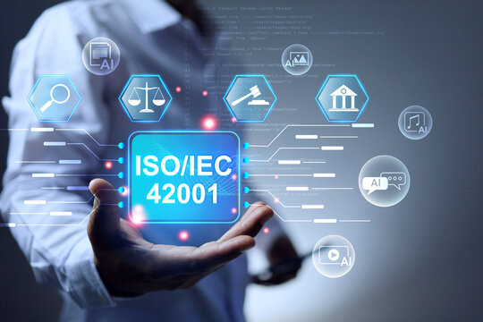 ISO IEC 42001 artificial intelligence management system concept with a man holding infographic to control AI activity management under standards regulation requirement