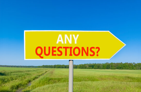 Any questions symbol. Concept words Any questions on beautiful yellow road sign. Beautiful blue sky green grass field background. Business and Any questions Q and A concept, copy space.