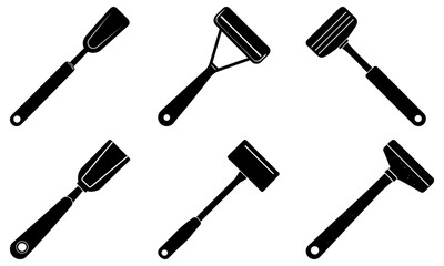 Collection of various paint rollers and brushes arranged in a circular pattern on a clean surface