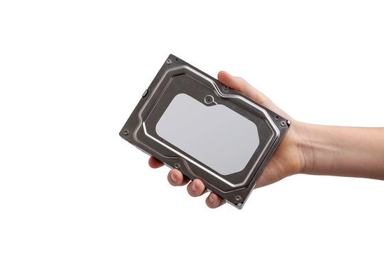 Isolated hand holding closed hard disk drive. Transparent, computer storage device used for data backup and archive