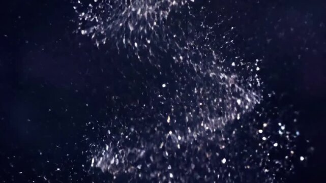 Dreamy Particle Suspension Describe the feeling of weightlessness and fantasy, with glitter particles slowly floating and creating a magical, enchanting ambiance and soft focus.