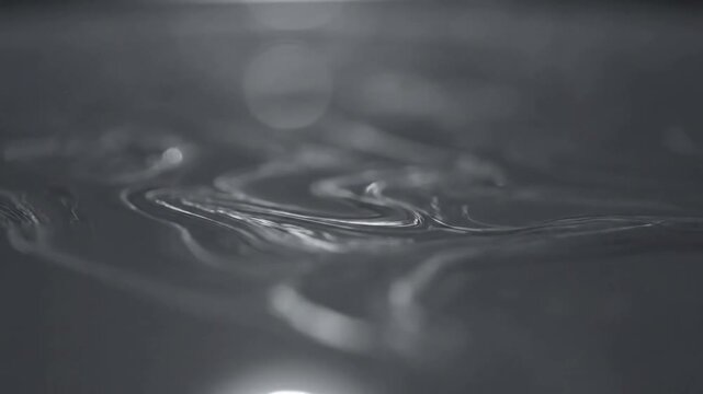 Subtle Dynamic Textures Highlight the gentle, evolving movement of the interference ripples against a soft bokeh backdrop.