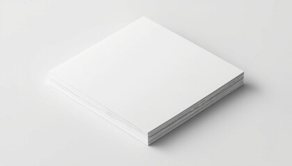 A stack of blank white paper sheets on a plain background