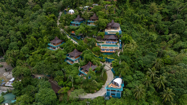 Drone aerial view of Karuna villas on the mountain near Corong Corong next to El Nido, The Philippines.