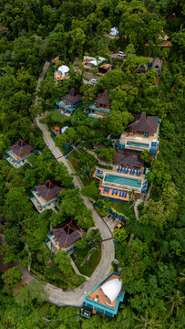 Drone aerial view of Karuna villas on the mountain near Corong Corong next to El Nido, The Philippines.