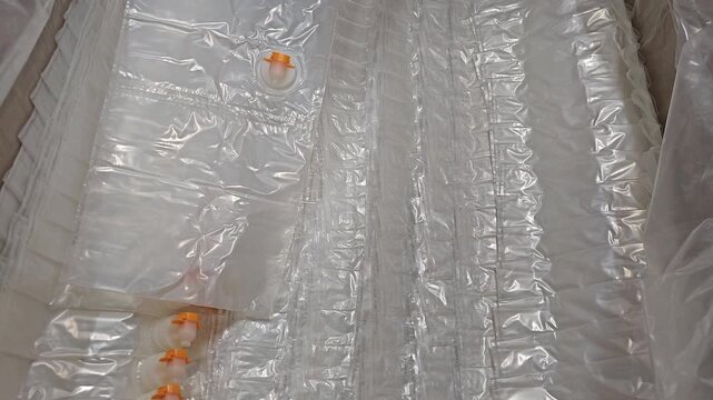 Aseptic bag magazine in a packaging machine. Juice filling machine used in the food industry.